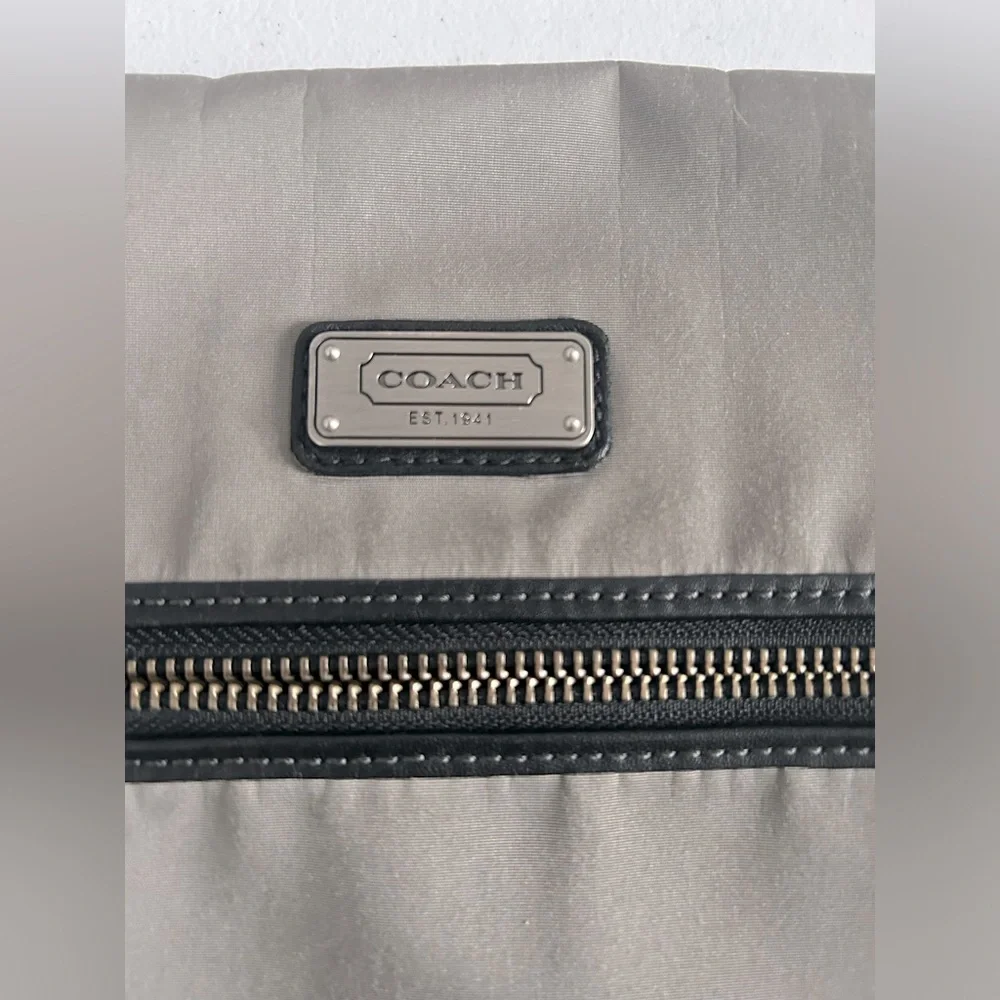 Unisex Coach crossbody messenger bag.